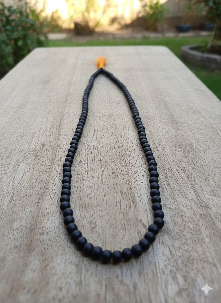 Matte Black Karungali Mala Beads With Orange Tassel