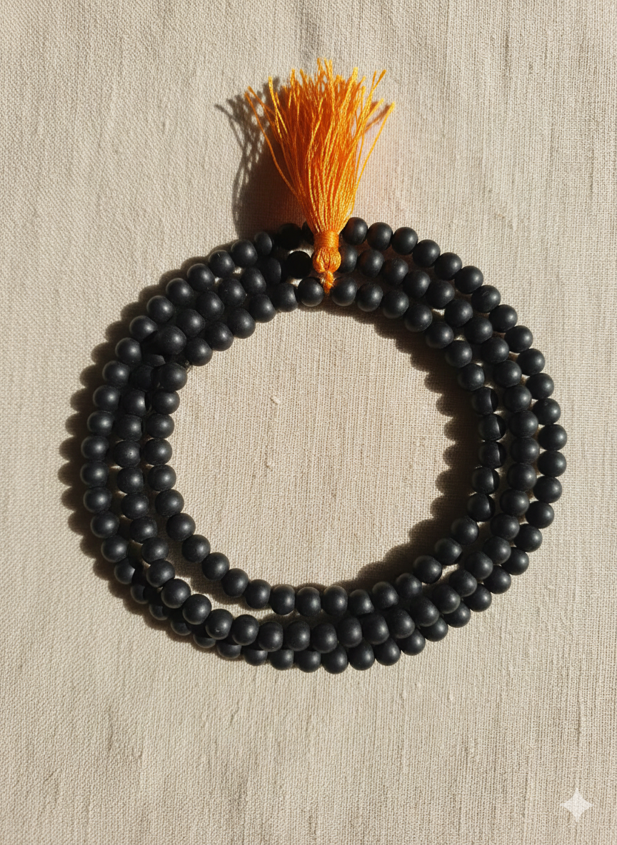Matte Black Karungali Mala Beads With Orange Tassel